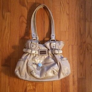 Kathy Van Zeeland beige handbag
